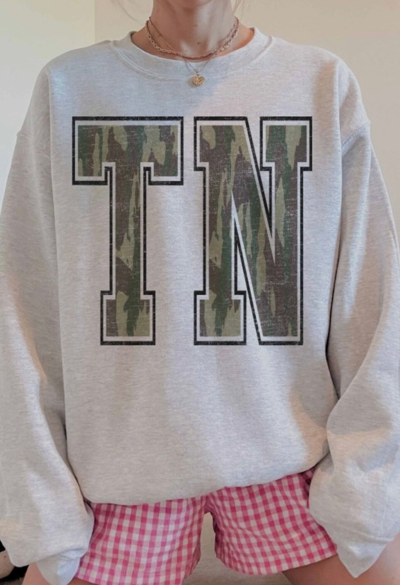 It’s The Letters On My Crew Neck Sweatshirt — “TN”