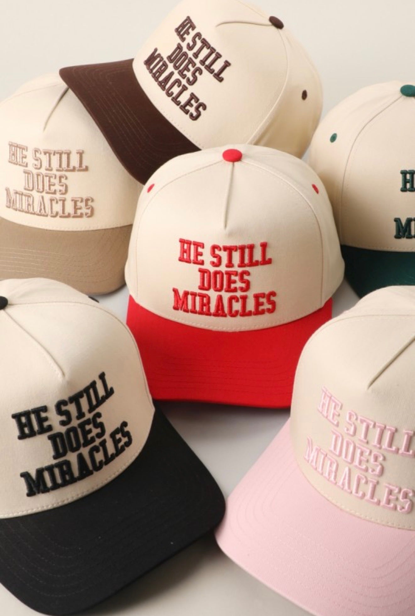 He Still Does Miracles Trucker Hat