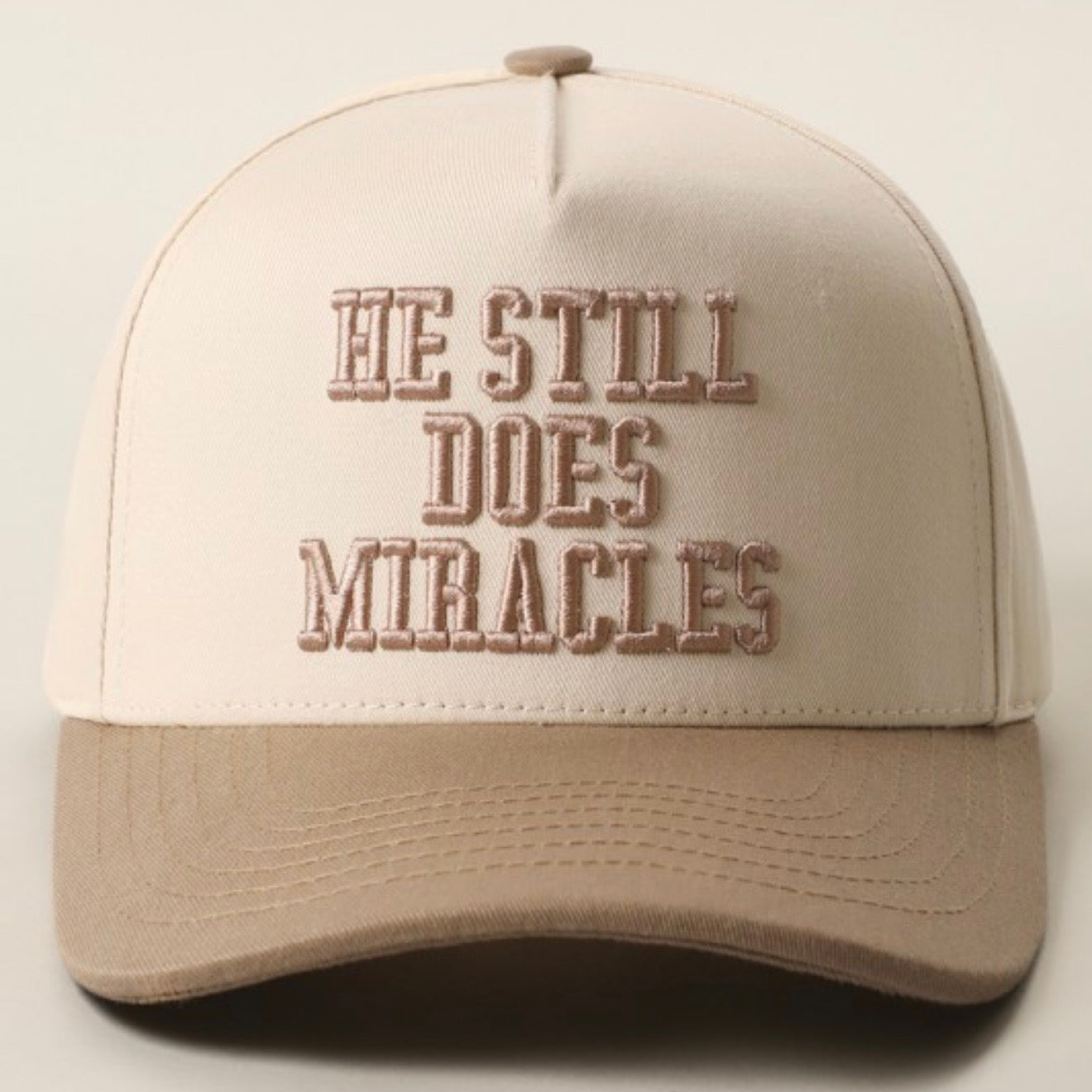 He Still Does Miracles Trucker Hat