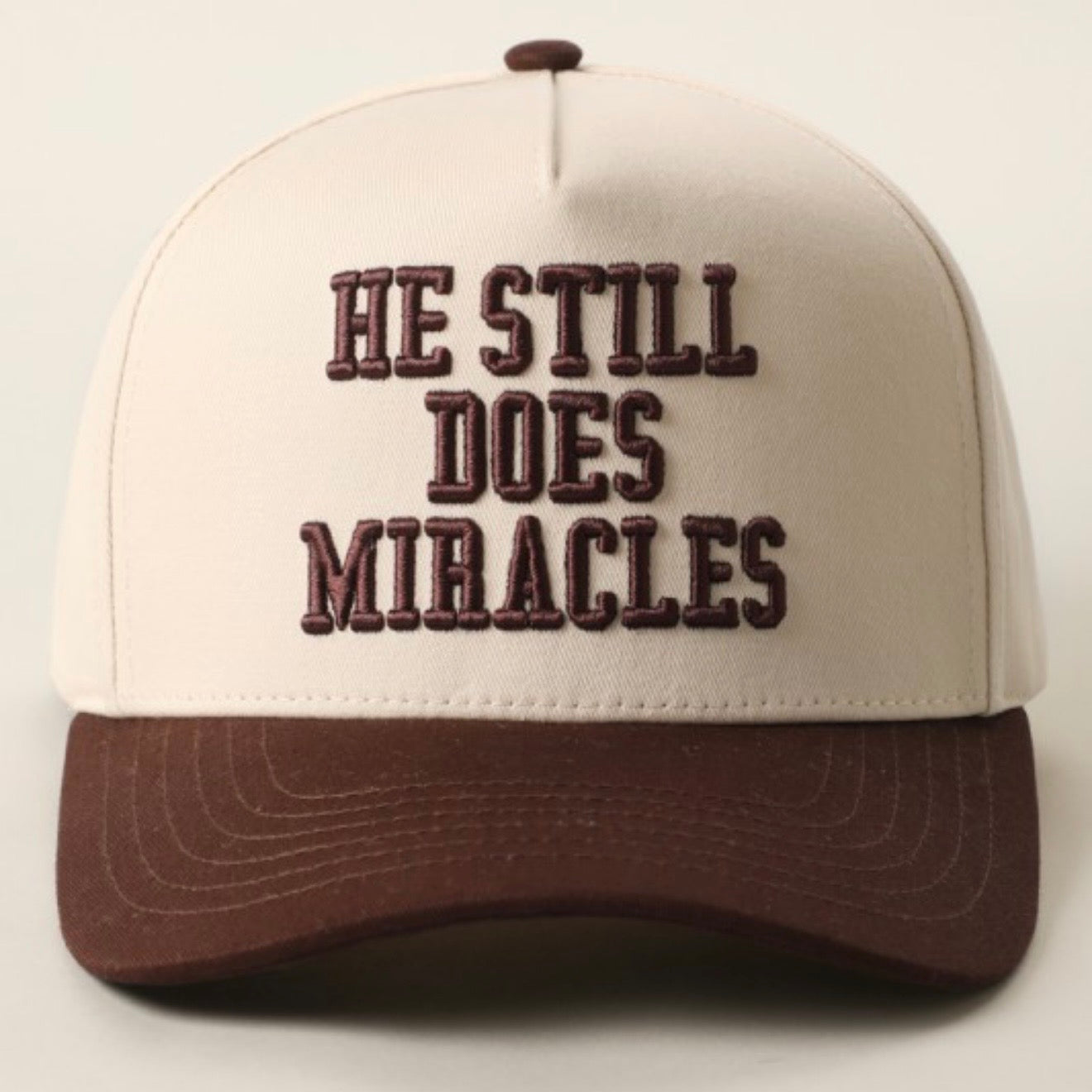 He Still Does Miracles Trucker Hat
