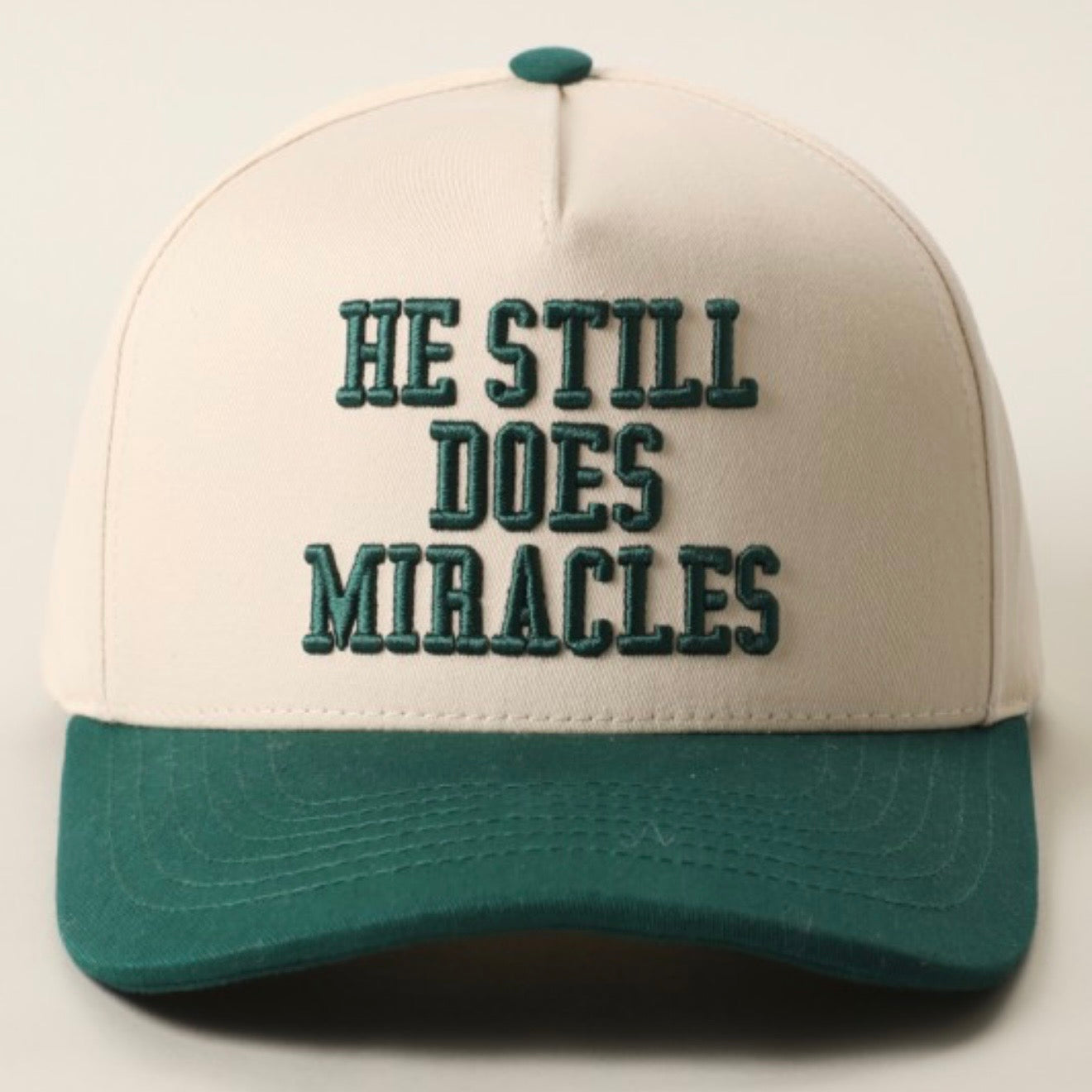He Still Does Miracles Trucker Hat