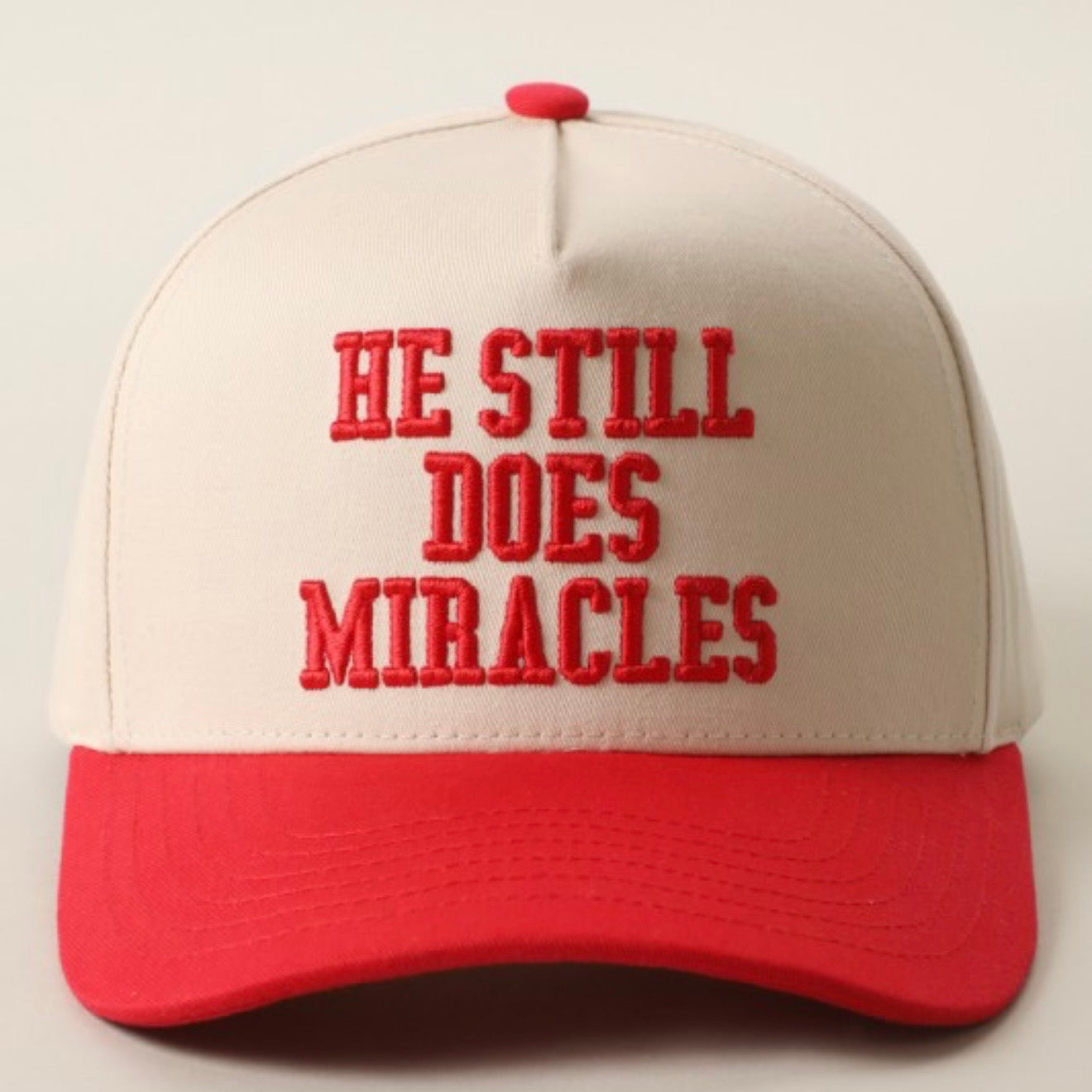 He Still Does Miracles Trucker Hat